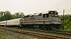 (Amtrak 345, an EMD F40PH pulls a passenger train through Porter, Indiana.