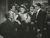 Alice Faye (centro) con Jack Haley (izq.), Don Ameche, y Tyrone Power (der.), en Alexander's Ragtime Band (1938)