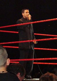 Justin Roberts WWE Ring Announcer RAW House Show 6-23-07.jpg