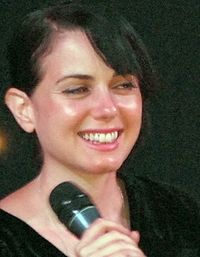 Mia Kirshner red lighted cropped 2.jpg