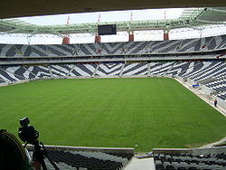 Seats and field of Mbombela Stadium.jpg