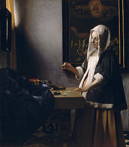 Woman Holding a Balance (Vermeer).jpg