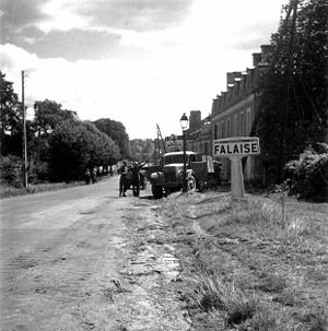 Canadian soldiers at Falaise town entrance.jpg