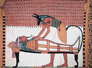 Anubis attending the mummy of Sennedjem.jpg