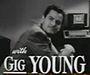 Gig Young in Old Acquaintance trailer.jpg